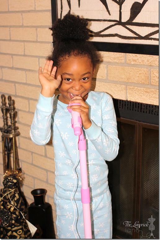 My niece singing on her Disney microphone