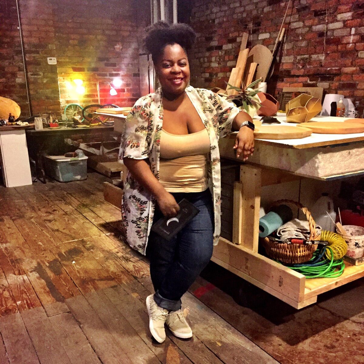 Black girl at hackerspace OmniCorpDetroit.